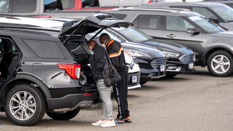 EV carmakers work to fit auto dealers into their future plans