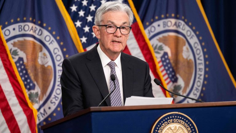 Fed pauses rate hikes, sees two more ahead this year